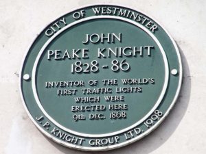 Insignia para el inventor del primer semáforo Insignia circular en honor a John Peake Knight quien fue el inventor del primer semáforo