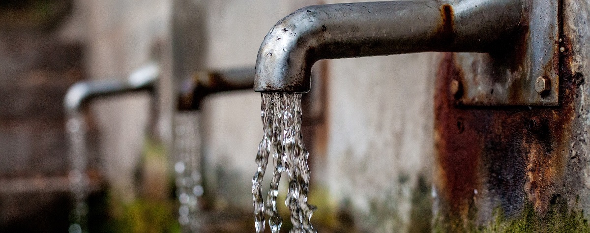 Image of taps anchored to the wall