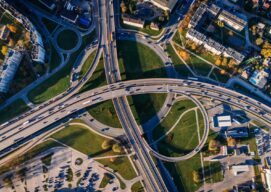 an aerial view of a highway depicting inclusive urban mobility